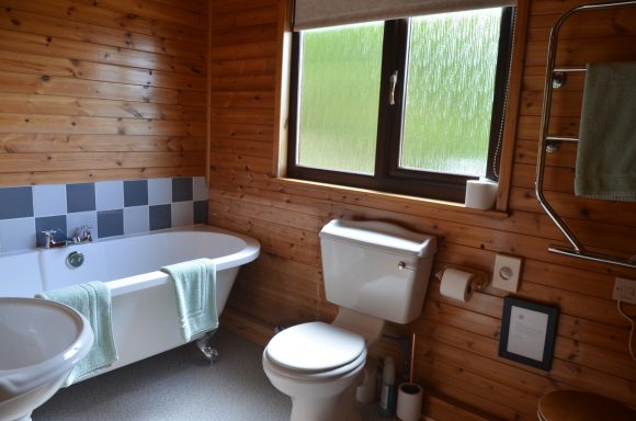 bathroom with large bathtub in holiday home
